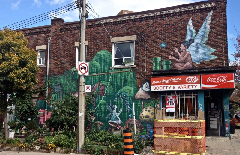 Outdoor Mural of Fairyland and storefront